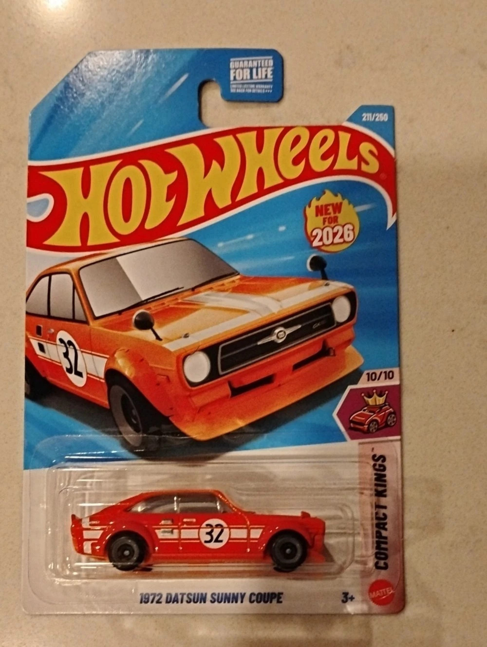 Hot Wheels 1972 Datsun Sunny Coupe Orange Die-Cast Car